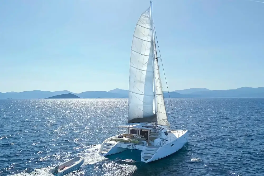 What is the cancellation policy for catamaran rentals in Italy?